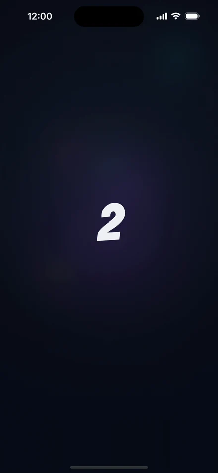 Tela do app na hora de revelar a letra: a soma dos dedos, 2, no centro da tela.